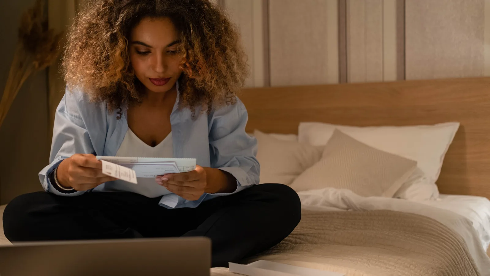Woman reviewing statements and credit information