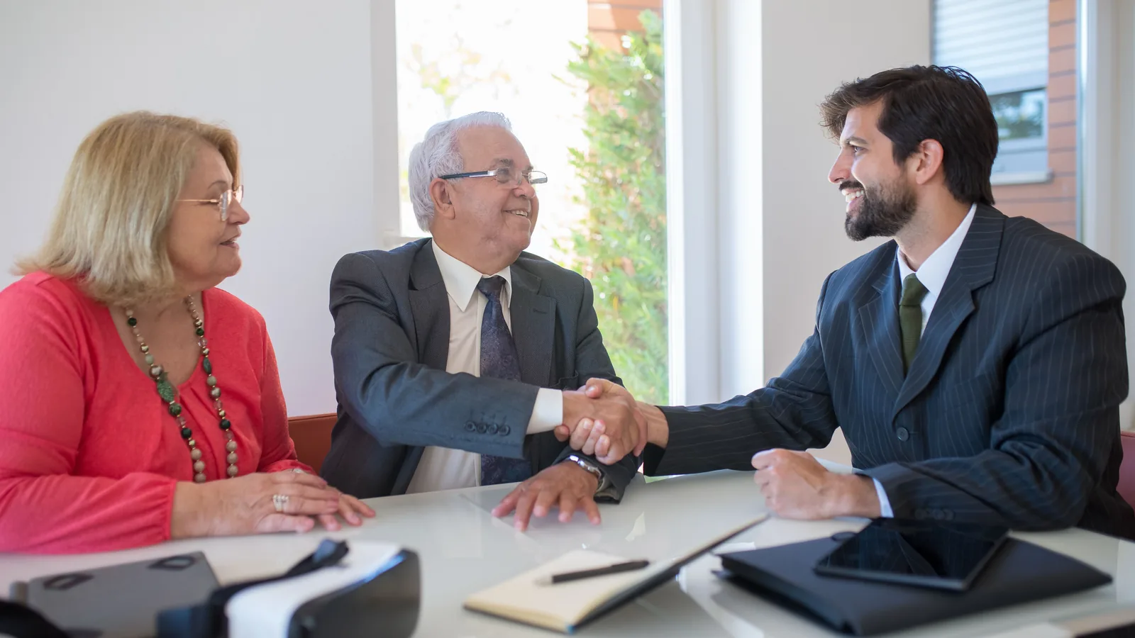 Couple meeting an advisor to review AmONE Loans options