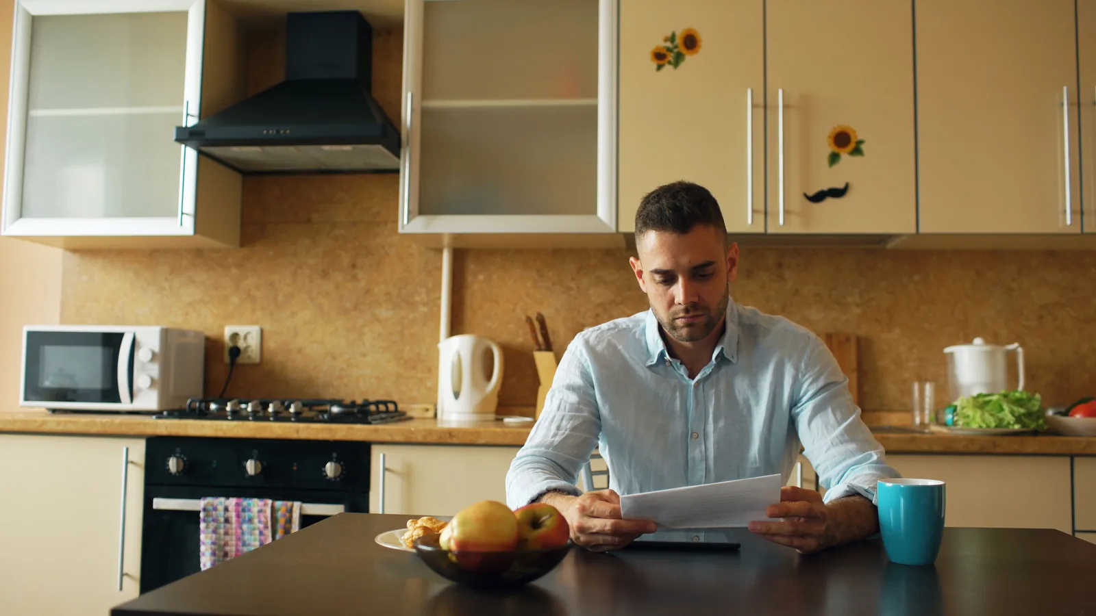 Reviewing AmONE Loans options for bad credit at the kitchen table