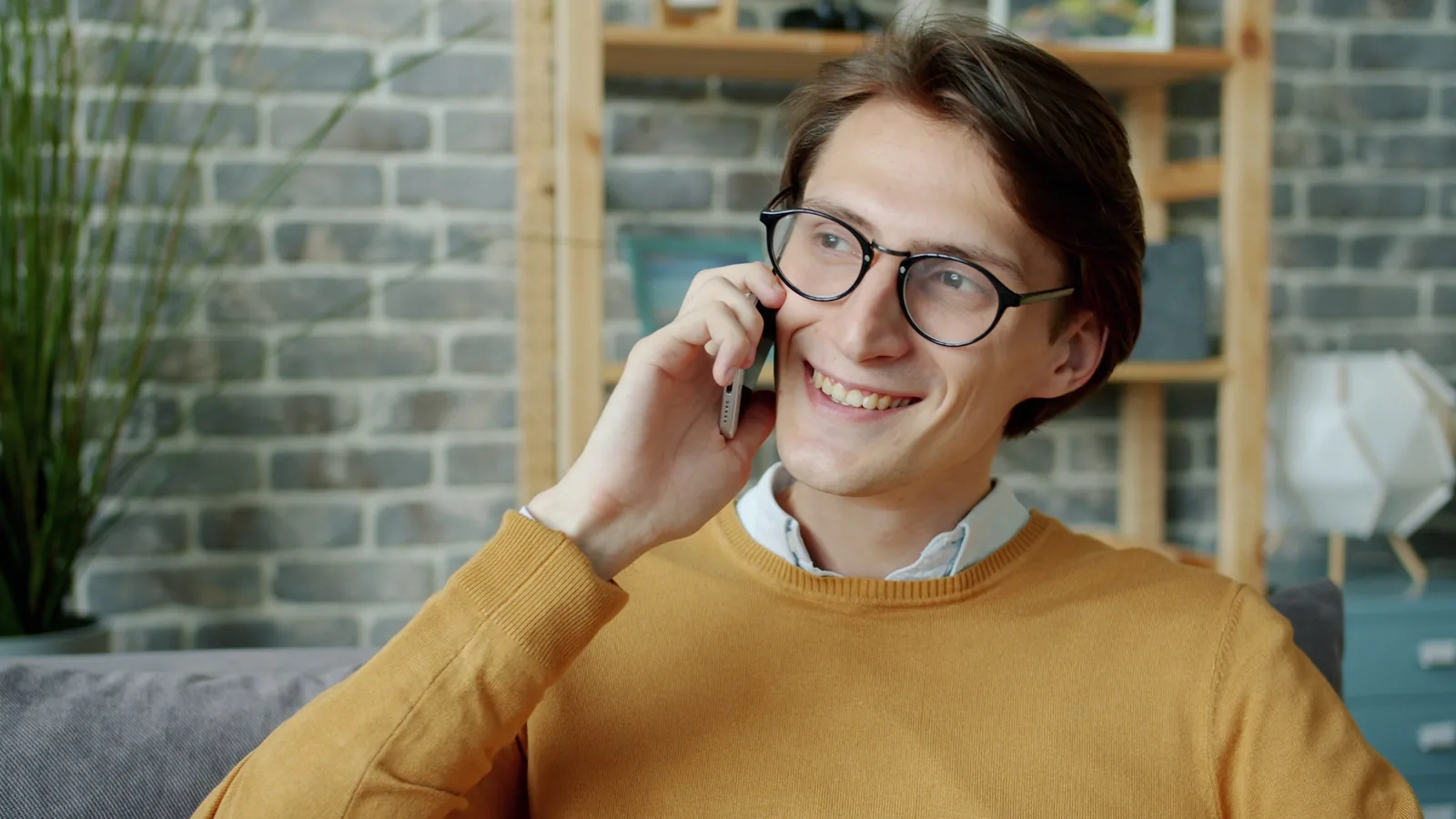 Borrower discussing an AmONE Loans personal loan by phone